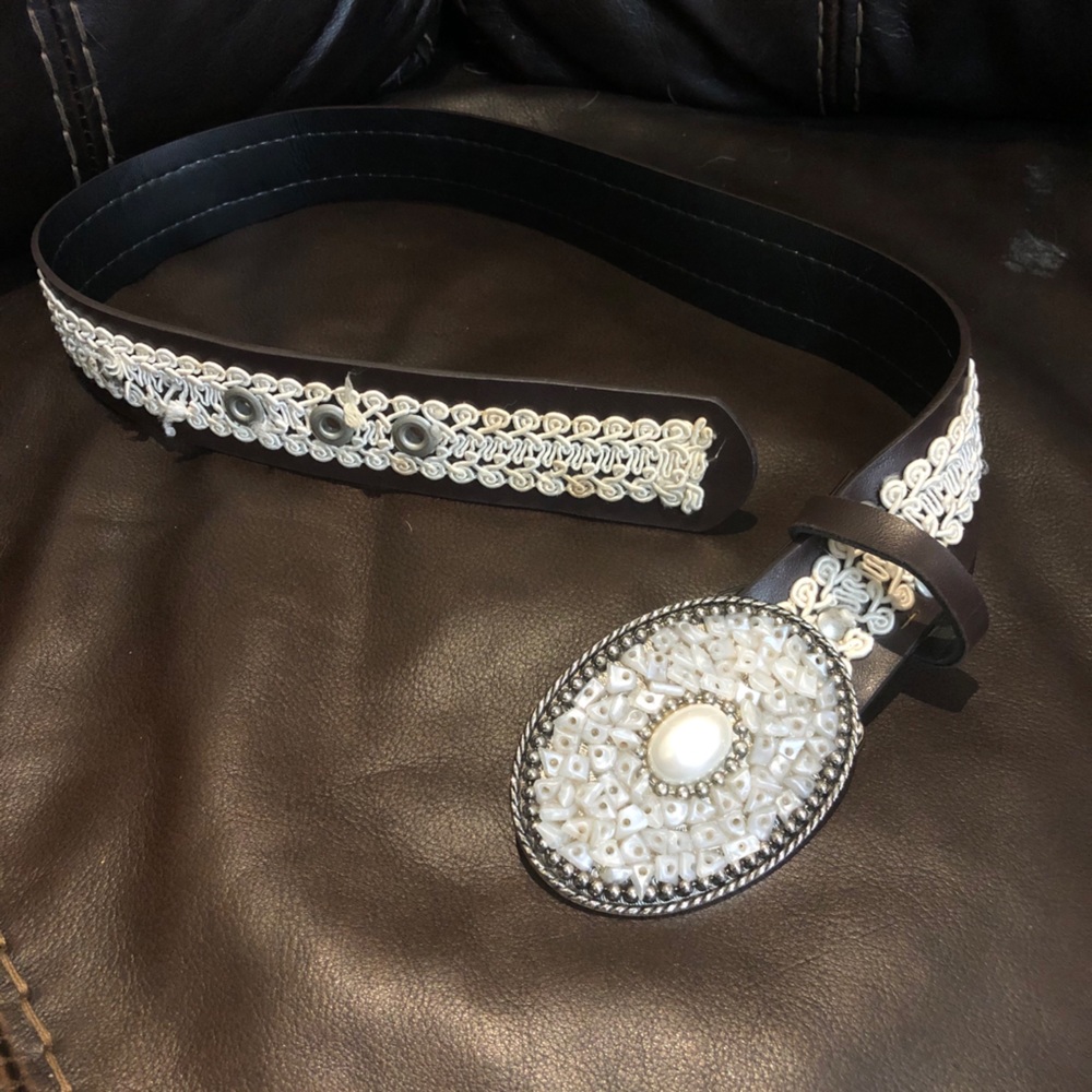 Brown belt with decorative buckle